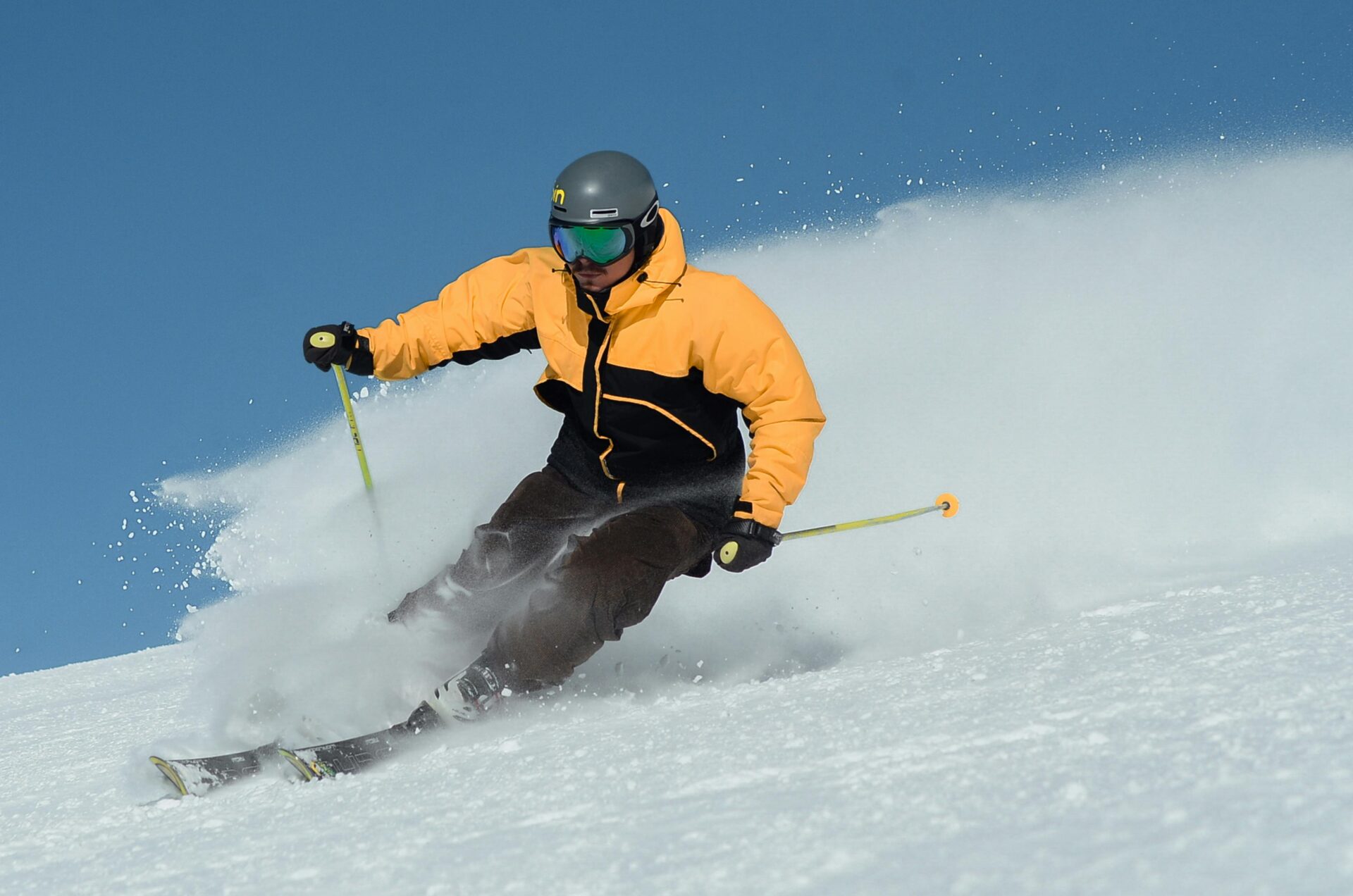 Skier in a Yellow Jacker