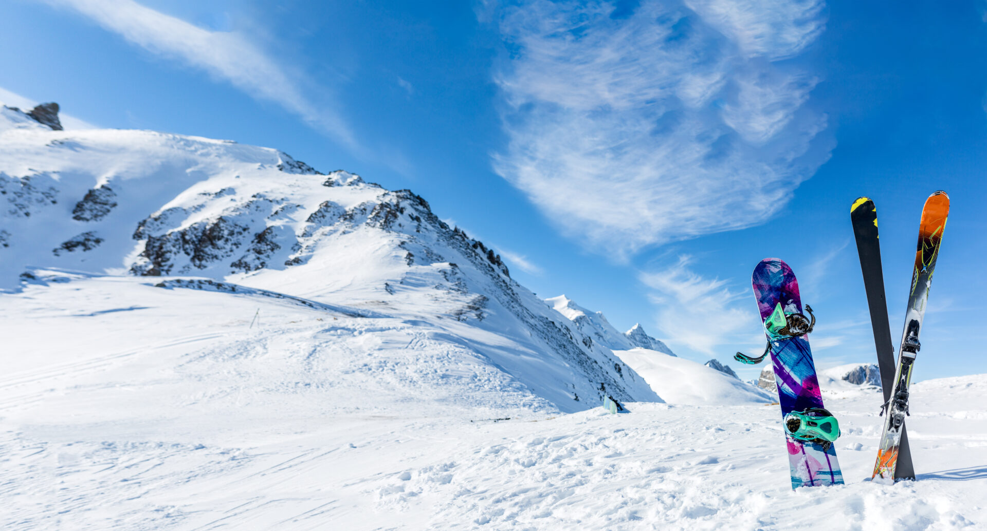 pair of skis and a snowboard