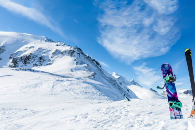 pair of skis and a snowboard