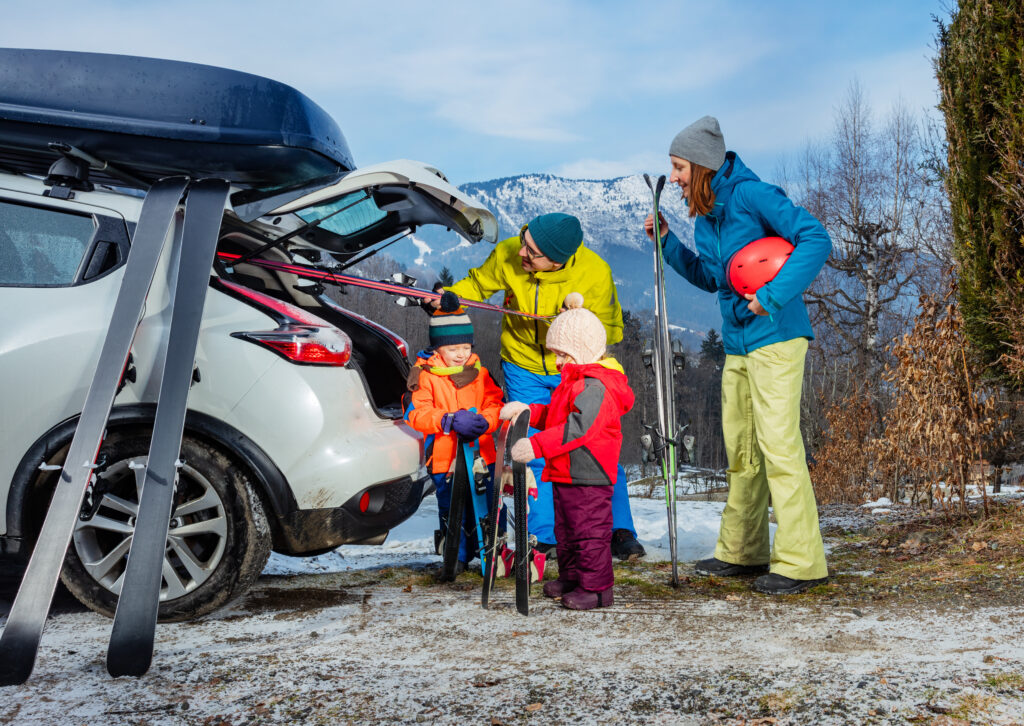 family getting ready to go skiing